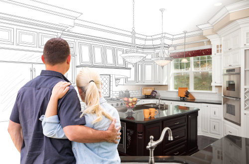 Two people embrace looking forward at a kitchen that is sketched out around the edges and colored in the middle.